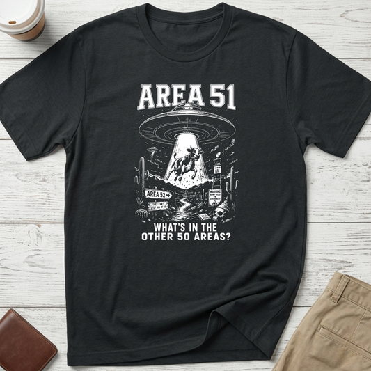 Area 51 graphic t-shirt featuring a flying saucer abducting a cow with the funny quote "What's In The Other 50 Areas?" on a black unisex tee.
