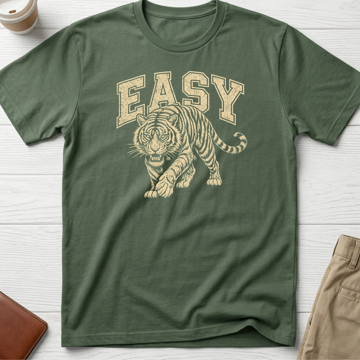 Easy Tiger graphic t-shirt featuring a vintage-style prowling tiger illustration with retro collegiate lettering on green unisex tee.