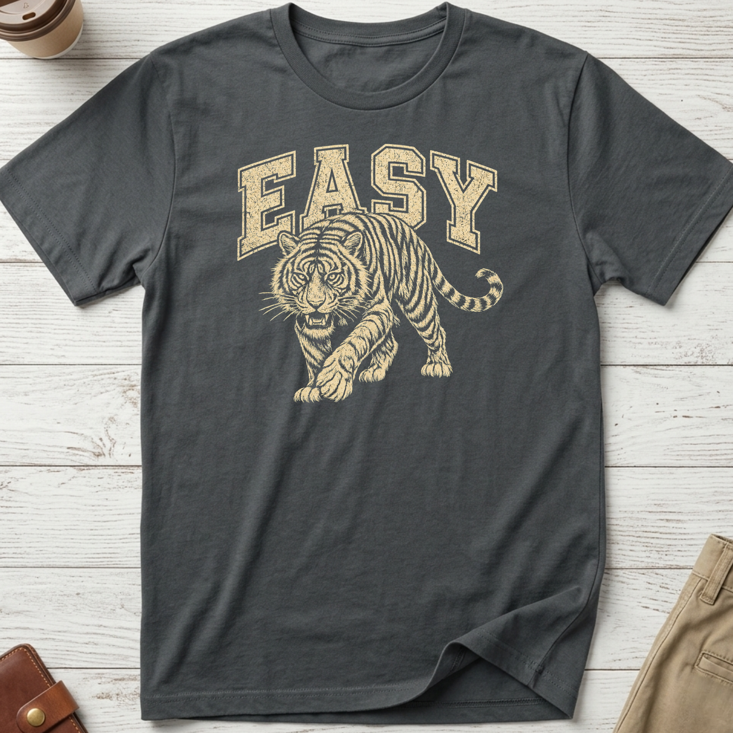 Easy Tiger graphic t-shirt featuring a vintage-style prowling tiger illustration with retro collegiate lettering on charcoal unisex tee.