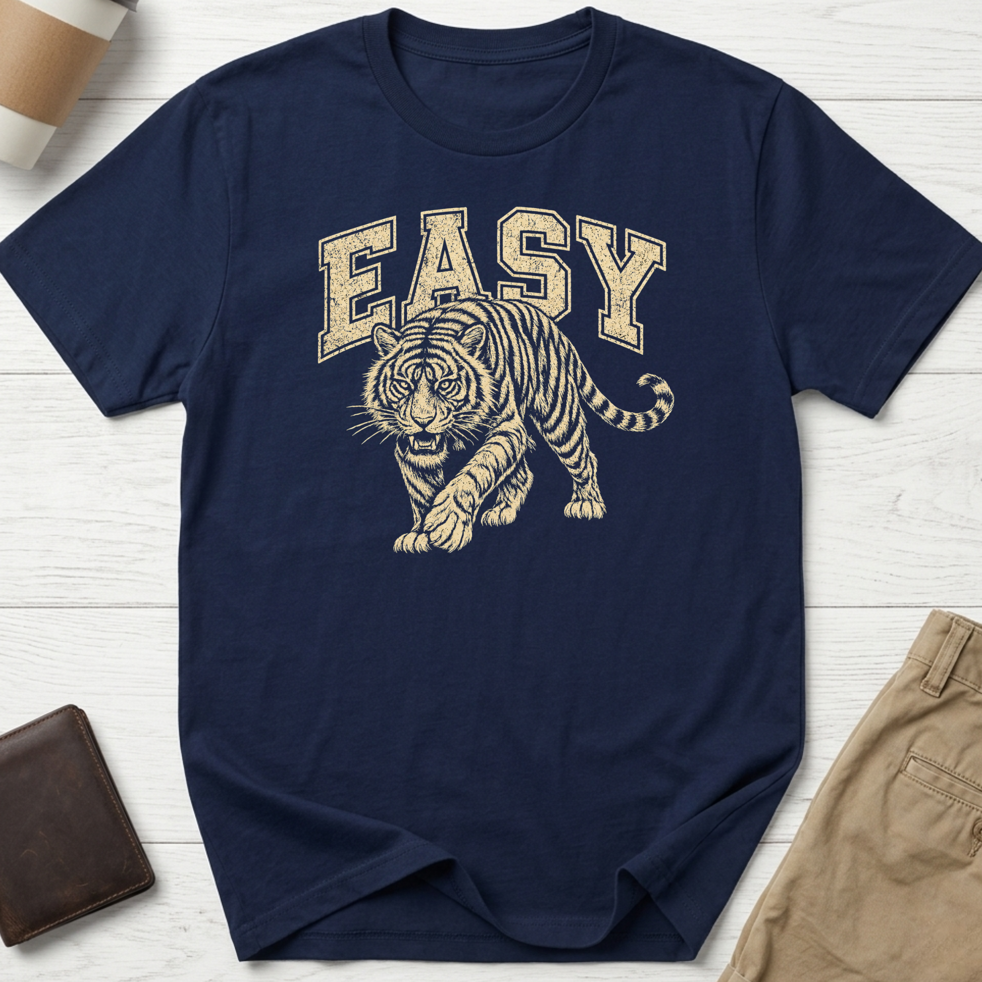 Easy Tiger graphic t-shirt featuring a vintage-style prowling tiger illustration with retro collegiate lettering on navy unisex tee.
