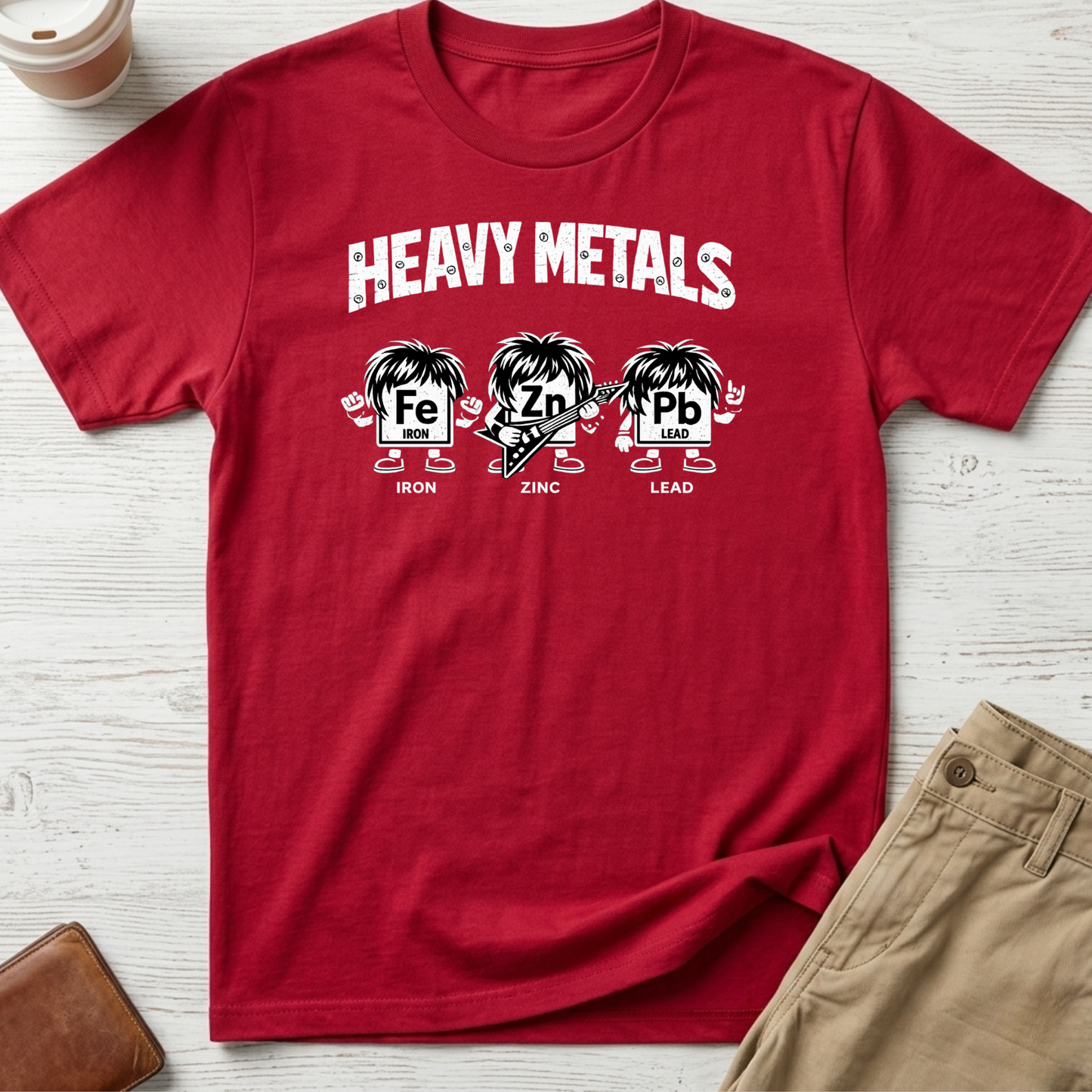 Heavy Metals funny graphic t-shirt featuring Iron, Zinc and Lead characters in a rock band parody design on red unisex tee.