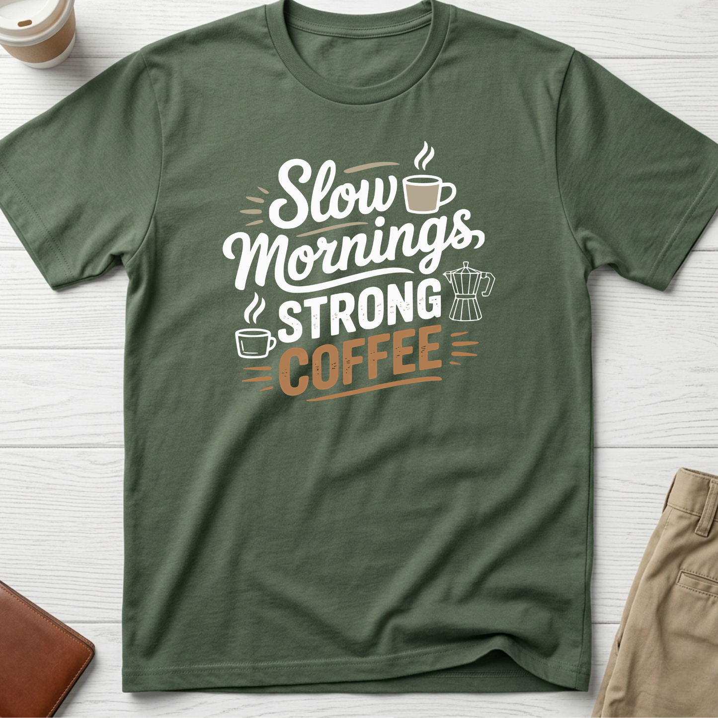 Slow Mornings Strong Coffee graphic t-shirt featuring stylish typography with coffee cup and moka pot illustration on green unisex tee.