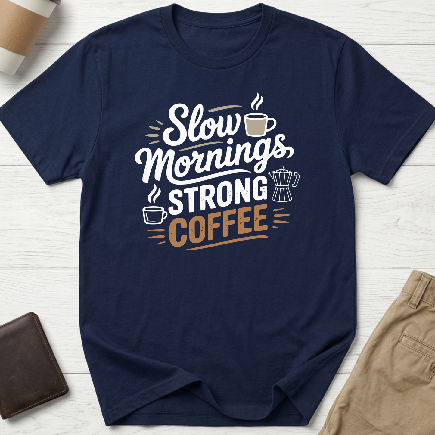 Slow Mornings Strong Coffee graphic t-shirt featuring stylish typography with coffee cup and moka pot illustration on navy unisex tee.