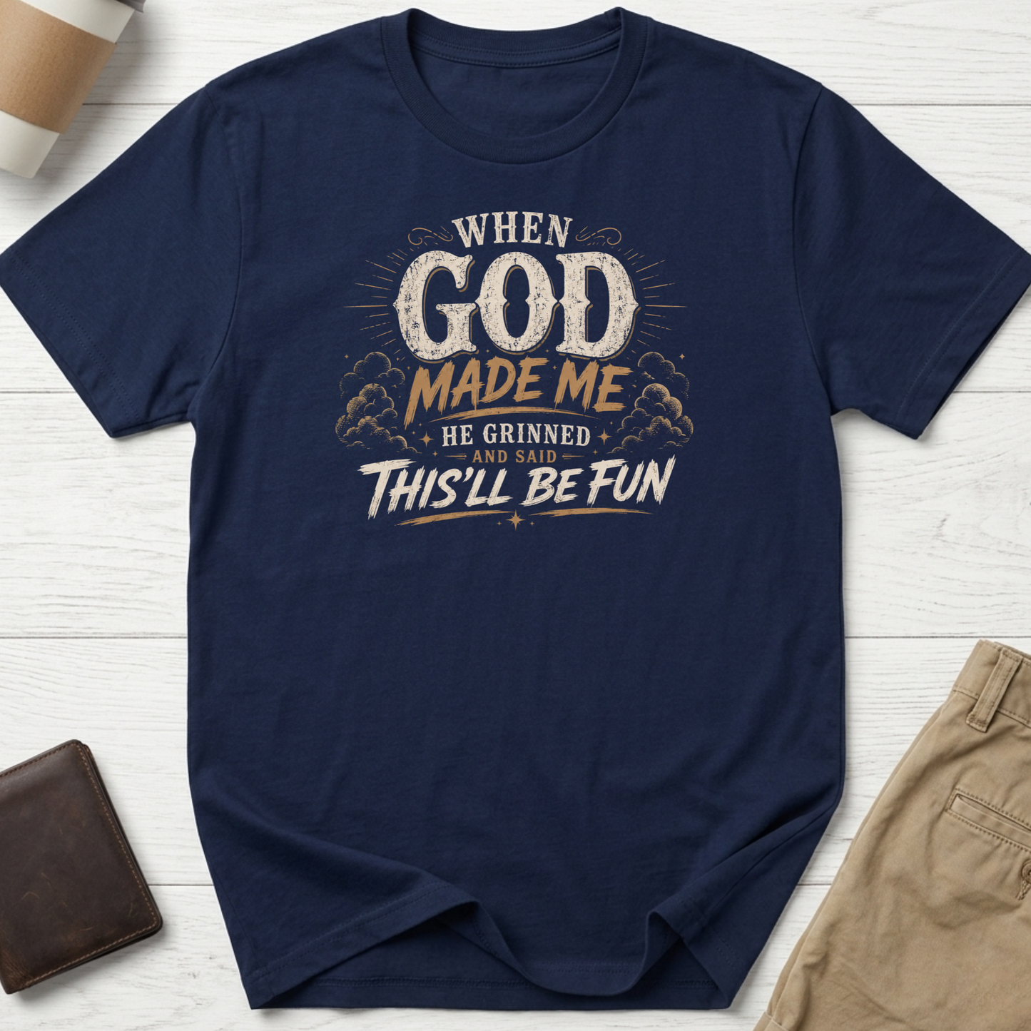 When God Made Me He Grinned And Said This'll Be Fun graphic t-shirt featuring distressed vintage typography on a navy unisex tee.