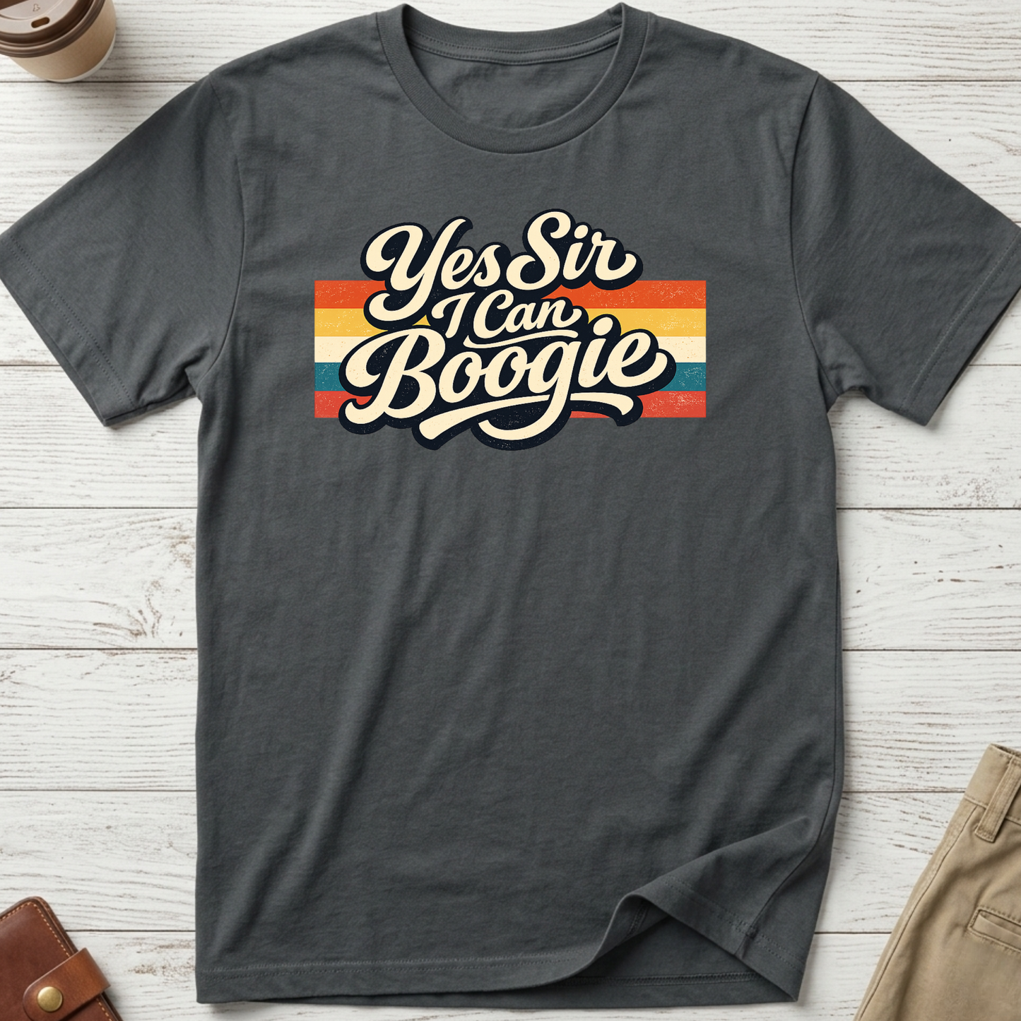 Yes Sir I Can Boogie retro graphic t-shirt featuring vintage typography with colourful 70s-inspired stripes on a grey unisex tee.