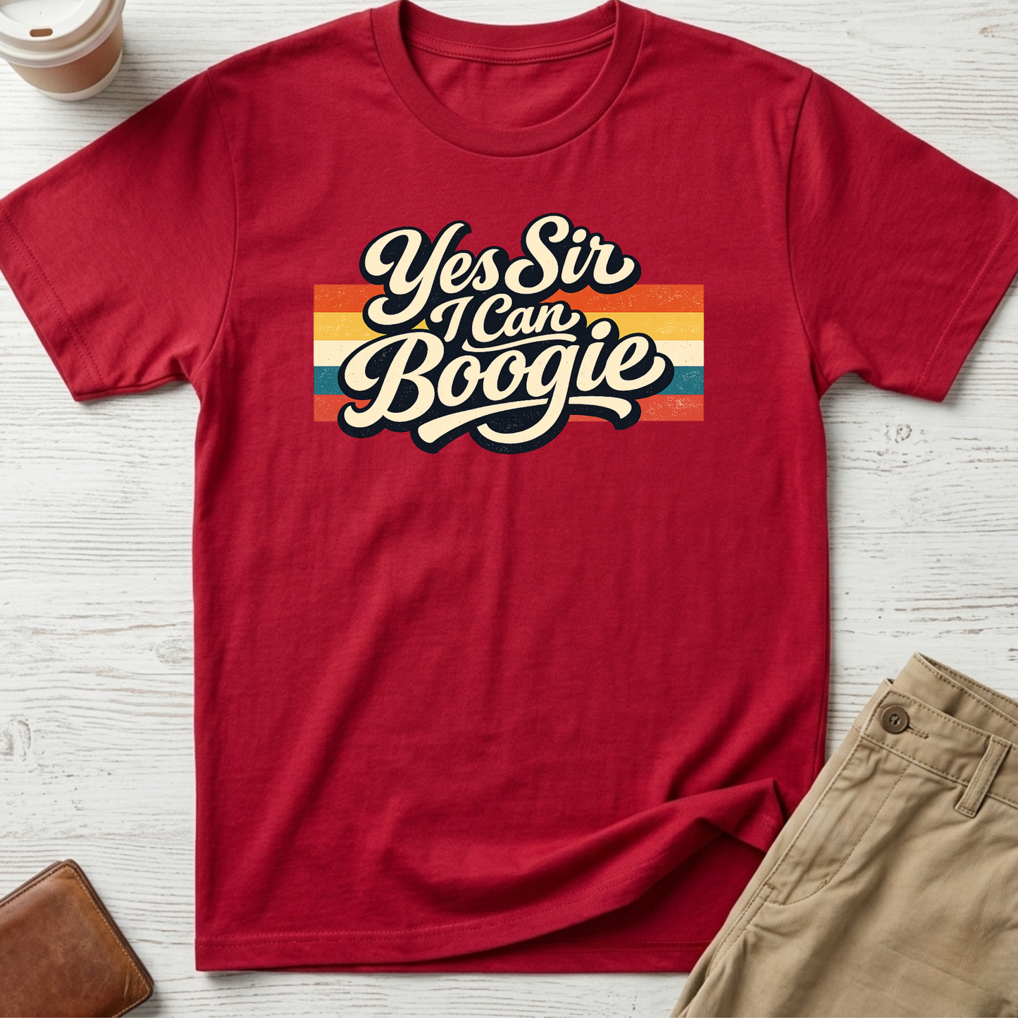 Yes Sir I Can Boogie retro graphic t-shirt featuring vintage typography with colourful 70s-inspired stripes on a red unisex tee.